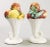 A lovely pair of vintage Mid Century Italian majolica fruit cornucopia, or horn of plenty, arrangements. Marked "Italy" on...