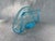 Lovely blue vintage folded art glass napkin holder. No marks. Holder measures 6 3/4" by 1 3/4" by 3 3/4". Very good...