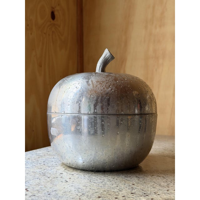 An exceptional and highly decorative piece of mid-century Italian barware, this vintage ice bucket is realistically...