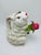 This adorable pitcher is a sweet bunny holding a flower. So fun for entertaining but also cute for display!