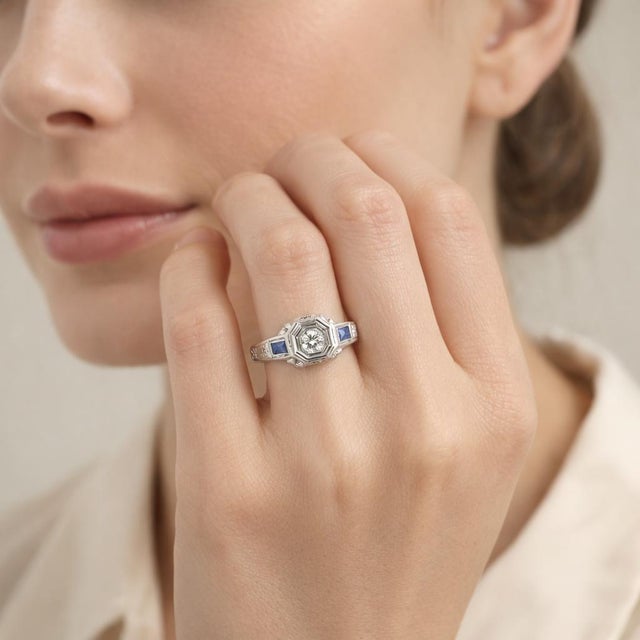 Elegant Art Deco 18K white gold ring set with natural diamonds totaling 0.24 Carat Total Weight (G/H color, SI clarity),...