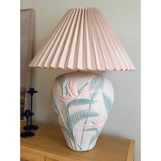 Beautiful matching pair of vintage circa-1980s oversized sculptural table lamps featuring raised Bird of Paradise flowers...