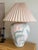 Beautiful matching pair of vintage circa-1980s oversized sculptural table lamps featuring raised Bird of Paradise flowers...