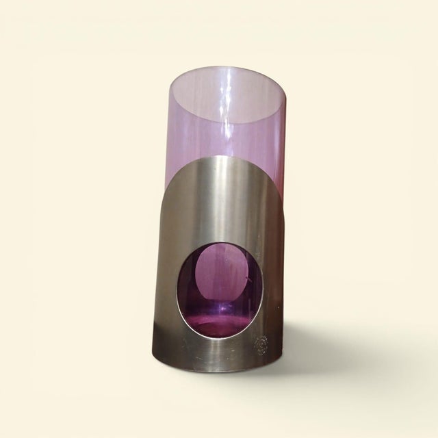 Murano vase in colored glass with a purple hue, the most intense part being at the bottom. Inserted in a 95% pewter base.