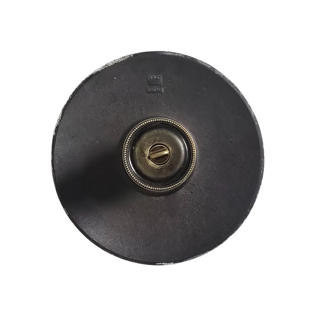 This exceptional Mid-Century Schlage Mayan doorknob and escutcheon plate exemplifies the geometric sophistication of...