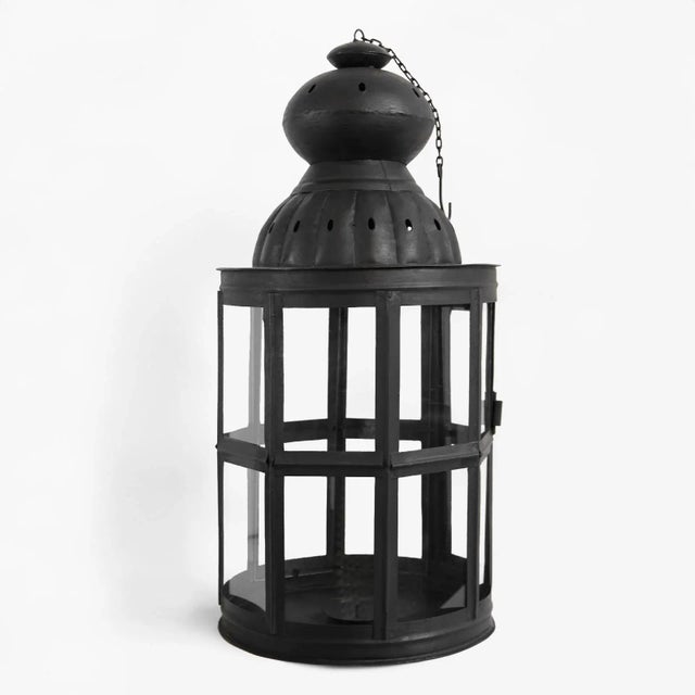Handmade vintage black matte iron lantern with glass window panels and door that opens to place candles. Comes with...