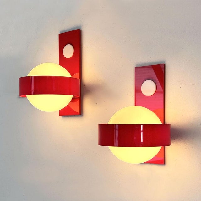 Space Age Wall Lamps in Red & White Glass & Plastic, 1970s, in Good conditions. Designed 1970 to 1979 Up to 250V...