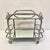 An Art Deco bar cart designed by renound French architect Robert Mallet-Stevens. (1886-1945). Stevens was the founder of...