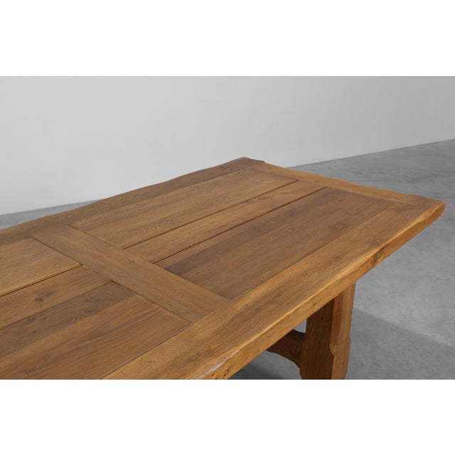 An impressive Brutalist dining table crafted in Belgium circa 1960. This piece exemplifies the bold geometry and raw...