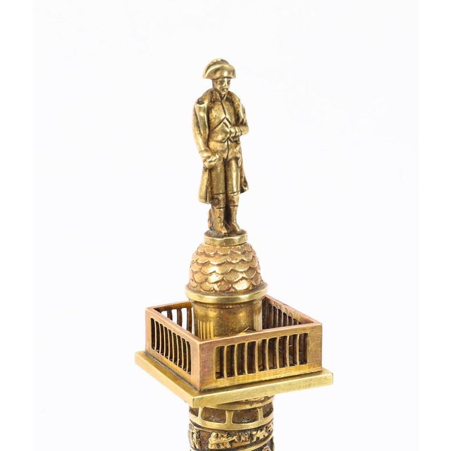 This is a wonderful antique French Grand Tour bronze model of the Vendome Column, circa 1880 in date. This splendid bronze...