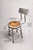 Authentic 1920s industrial metal stool with original worn patina and utilitarian character. Perfect as studio seating,...