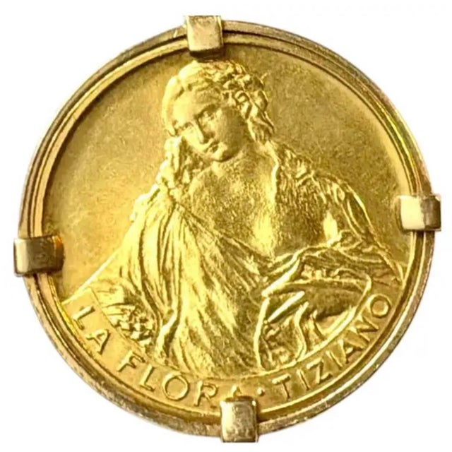 Vintage 18K "La Flora" Tiziano Medallion Pendant. Pendant features a detailed reproduction of Titian's Renaissance...