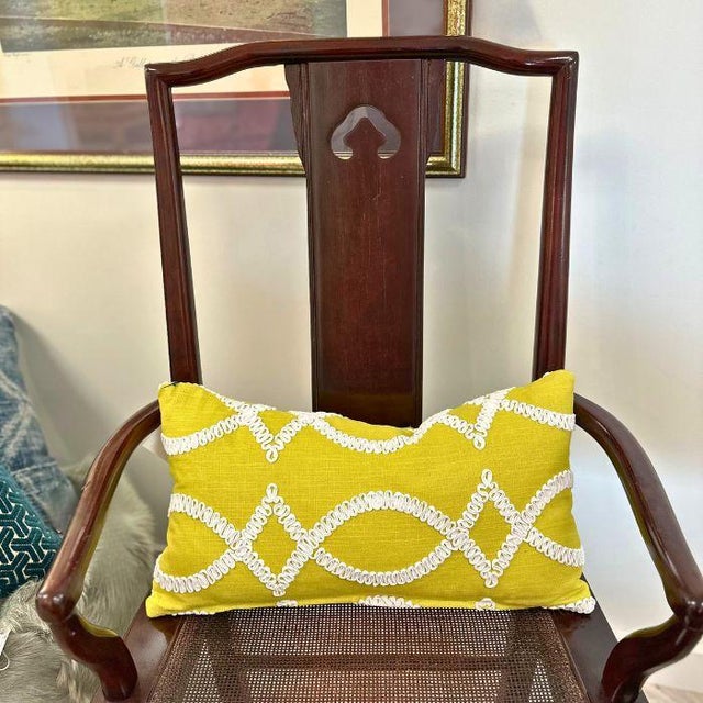 This 12" x 21" custom throw pillow features linen fabric from Kravet's Kate Spade collection in a beautiful chartreuse...