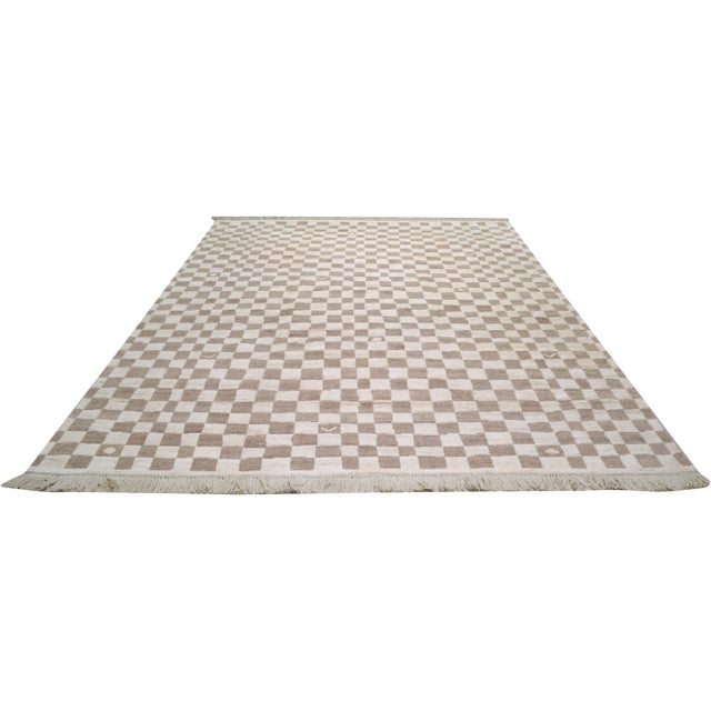 Hand Knotted Rug. Made of organic wool. Natural colors and soft texture. Optical squared pattern.