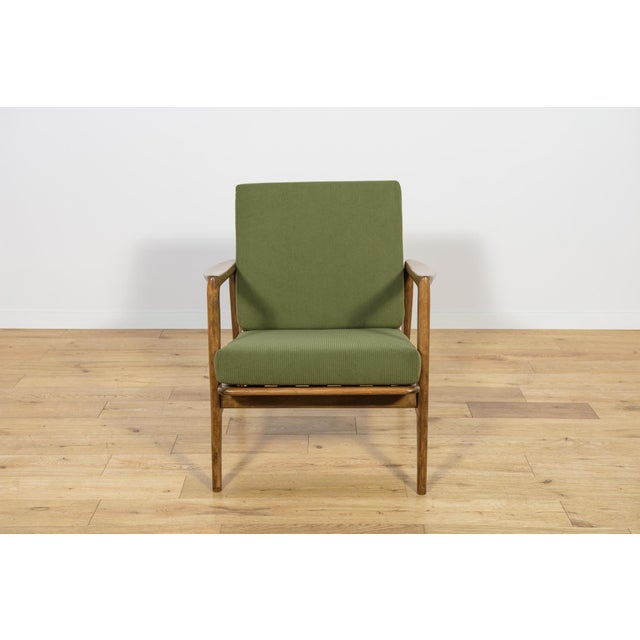 The armchair was produced by the Polish company Swarzędzka Furniture Factory in 60 s. The armchair have new cushions,...