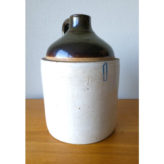One Gallon Antique Whisky Jug, this "Primitive" antique whiskey jug ihas a simple, utilitarian design, handcrafted nature,...