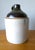 One Gallon Antique Whisky Jug, this "Primitive" antique whiskey jug ihas a simple, utilitarian design, handcrafted nature,...