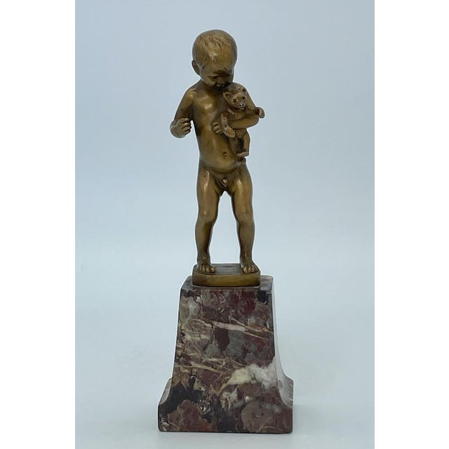 Small bronze with marble base, signed on the bronze. This piece has an attribution mark, I am sure that it is completely...