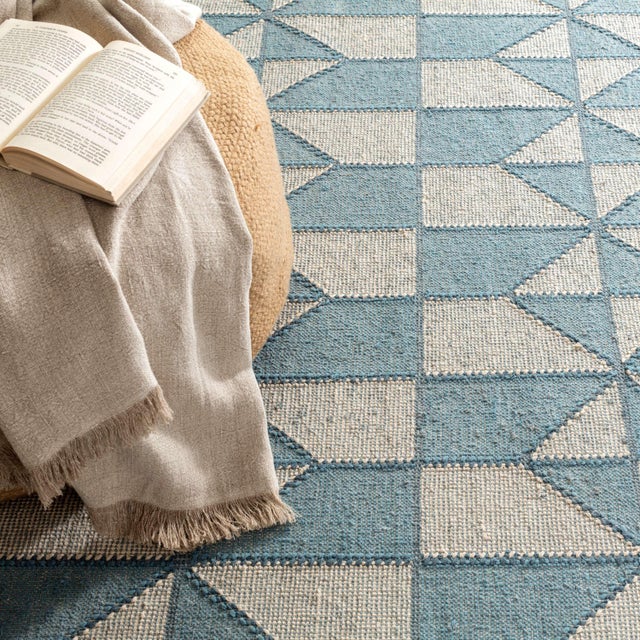 This loom knotted cotton beauty features a geometric diamond pattern with multi tonal textural stitches executed in two...