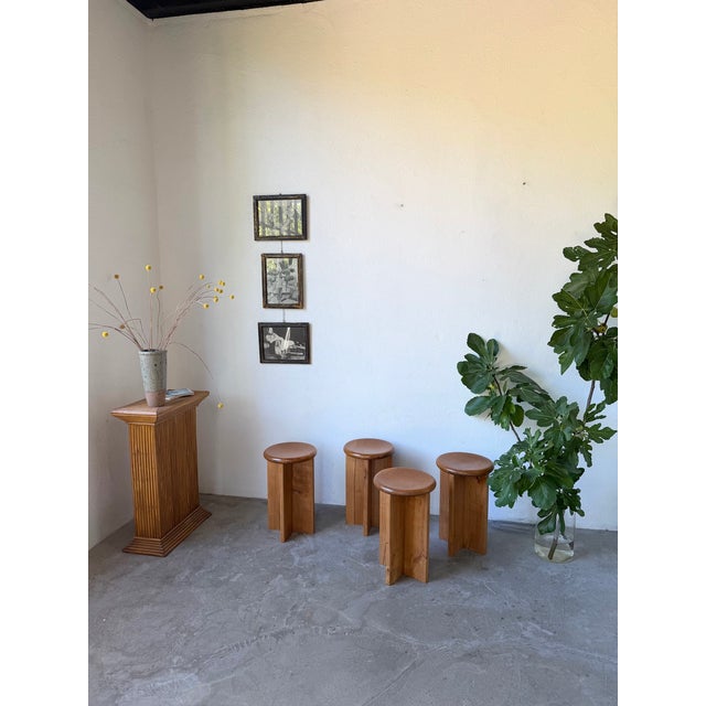 Set of four solid oak stools with a gilded, Constructivist-inspired design. We love the simplicity of the lines, the...