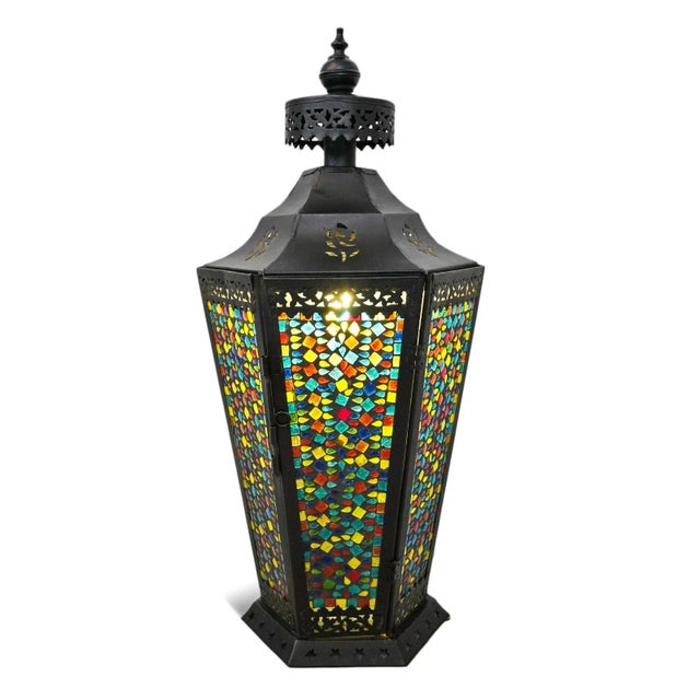 Vintage hand crafted mosaic colored glass table lantern with metal frame. Each is slightly unique. Bulb not included.
