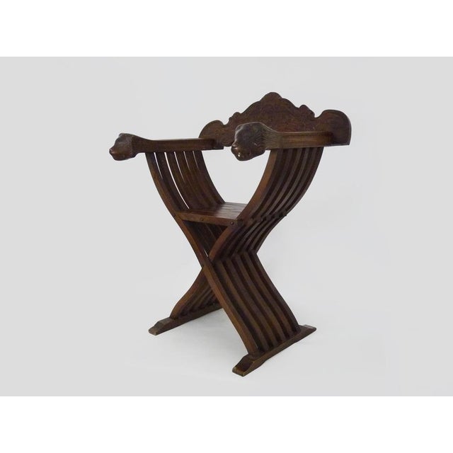 Vintage Savonarola Lion Head Chair in Wood, Italy, 1950s Beautiful Italian Savonarola armchair in wood, dating from the...