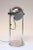 Chrome eyeball fixture supported by tubular chrome posts affixed to a round base in the style of Robert Sonneman (ca....