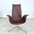 Dimensions: H 41.5” x W 31” x SD 17” x SH 17” Vintage brown leather swivel tulip chair designed by Preben Fabricius &...