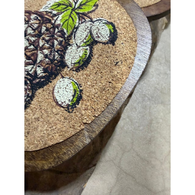 Add vintage tropical charm to your table or bar setup with this rare set of 5 mid-century paddle-shaped wood and cork hot...
