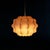 A substantial Cocoon hanging lamp in the style of Tobia Scarpa. The lamp is comprised of a curved wire frame and is...