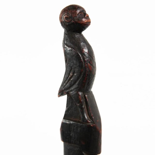 Rare and unusual carved wood Pygmy tool from Tanzania. Interesting image of a monkey head bird figure atop of the tapered...