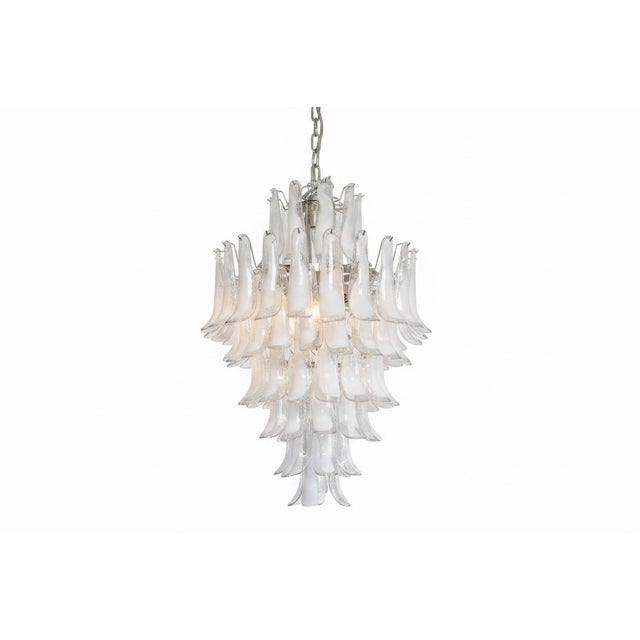DUTIES FREE An impressive Mazzega style, Murano chandelier, handcrafted in Italy, featuring 85 individually handblown...