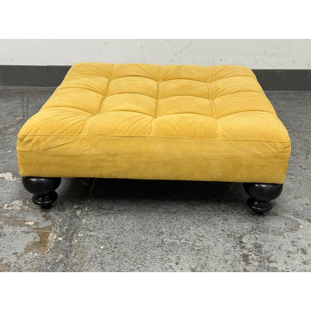 Design Plus Gallery presents a Tufted Essex Ottoman from West Elm. Upholstered in a golden yellow textile, this square...