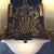 An elegant antique Art Deco five-light chandelier, dating to circa 1930, presents a sophisticated blend of bronze-finished...