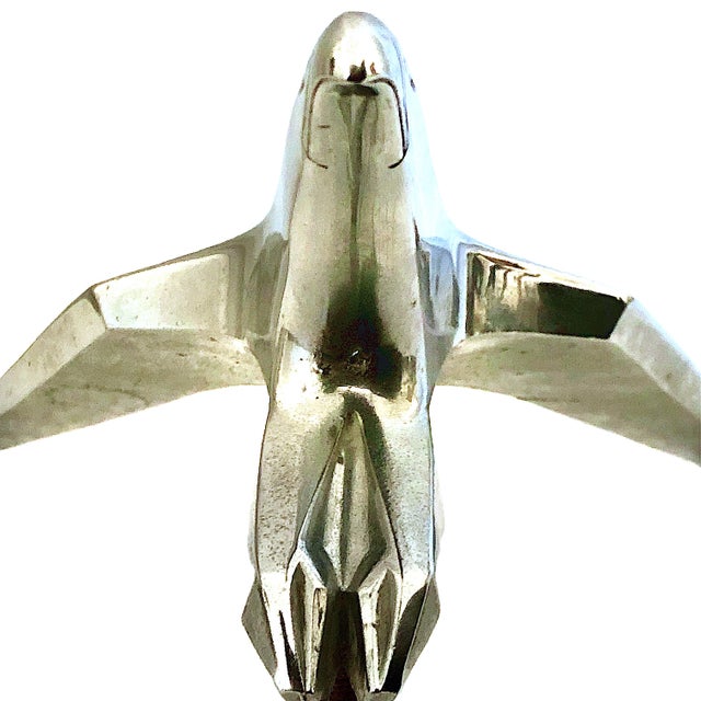 On offer is the iconic "Flying Eagle" hood ornament used on 1955–1956 Chrysler models such as the New Yorker, Newport and...