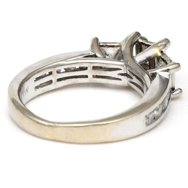 Diamonds are forever, and this ring is timeless. Set in 10-karat white gold, this beautiful princess and full cut diamond...