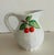 Bring the warmth of the Italian countryside into your home with this beautiful hand painted majolica pitcher. This richly...