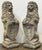 A pair of fine armorial lion garden statues from England - each lion elegantly poised on a stepped plinth base, exuding a...
