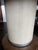 Theodore Alexander Sabon Dining Table II Mangrove Primavera Veneered Circular Top Overcast Komodo Embossed Leather Column...