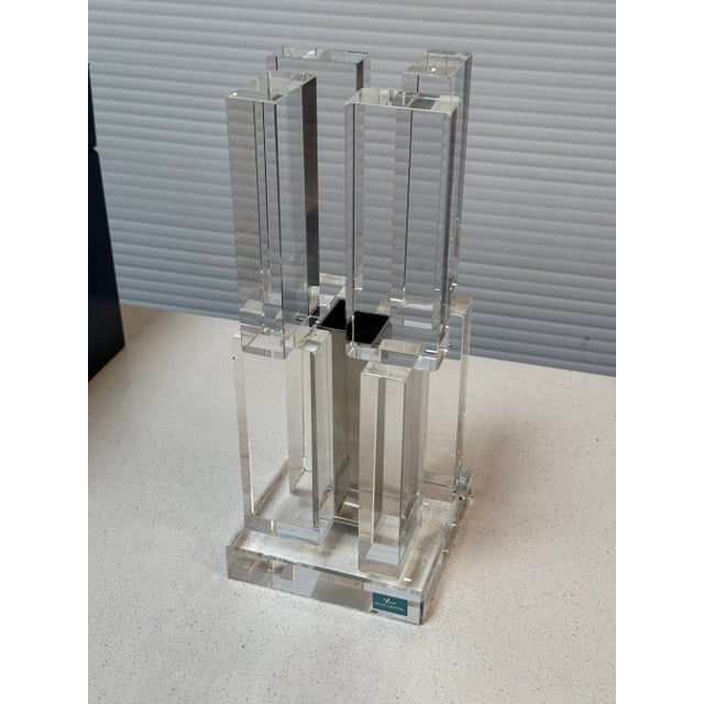 Design Plus Gallery presents a Motion Vase from Hoya Crystal. Study in contrast and balance, the vase pairs luminous...