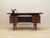 The desk was made in the 1960s, Danish production. The structure and the top are covered with rosewood veneer. The legs...