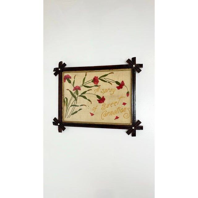 Antique Victorian framed embroidery. Romantic bunch of carnations with "A Spray of Sweet Carnations" in ornate lettering...