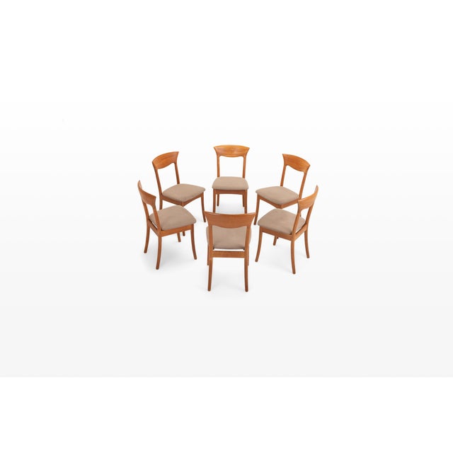 Set of six dining chairs designed by juul kristensen for jk denmark in the 1960s. The chairs have a light teak frame and...