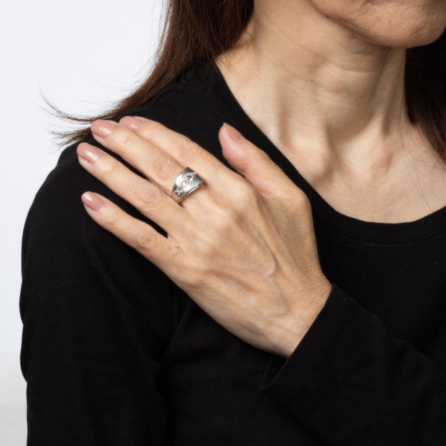 Contemporary diamond arrow ring crafted in 14 karat white gold. Old mine cut diamonds total an estimated 0.50 carats...