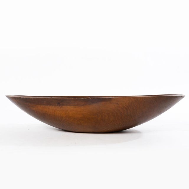 19th Century carved maple dough bowl trencher with carved out hand holds a gorgeous piece of American craftsmanship.