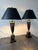 These timeless Lamps comprise a verdigris patinated bronze handled urn that sit on a marble wax-stone base decorated with...