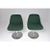 A pair of swivel chairs by Robin Day, dating to the 1960s. The design is defined by molded shell seats, central aluminum...