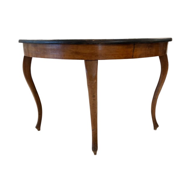 A graceful pair of Swedish walnut demilune tables with rich patina, elegant curved fronts, and cabriole legs — perfect for...