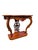 A dramatically carved Rococo Revival style entryway console table, built to stand flush against a wall and make a...