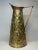 This English made embossed brass pitcher tells the story of an English pub scene of a group of men having a pint or dram....